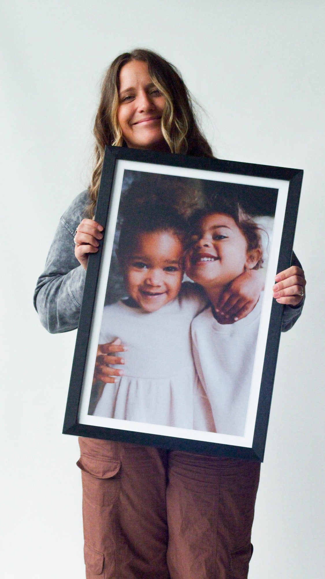 Smallwoods custom acrylic framed print with family photo, UV-filtering acrylic front, real wood frame