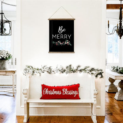 Smallwoods Be Merry Sign, with "Be Merry" printed in white on black hanging canvas.