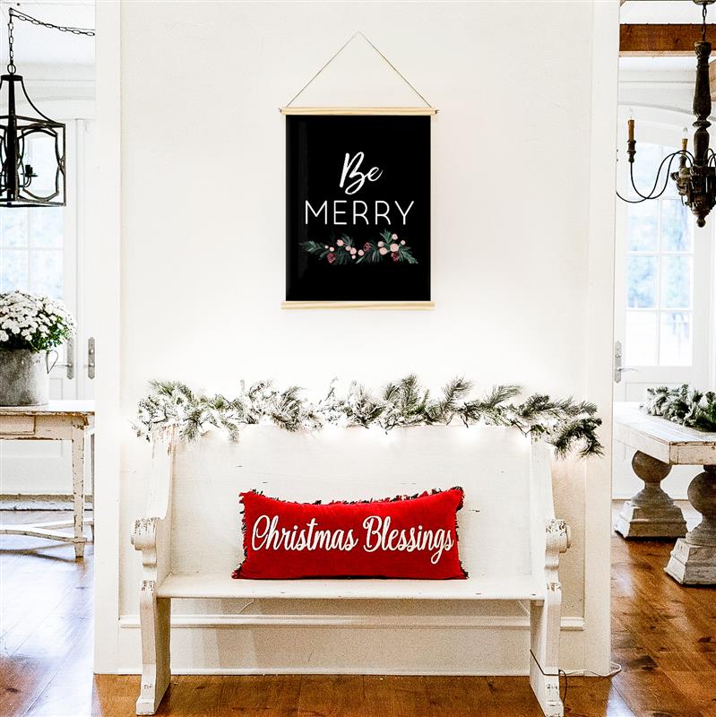 Smallwoods Be Merry Sign, with "Be Merry" printed in white on black hanging canvas.