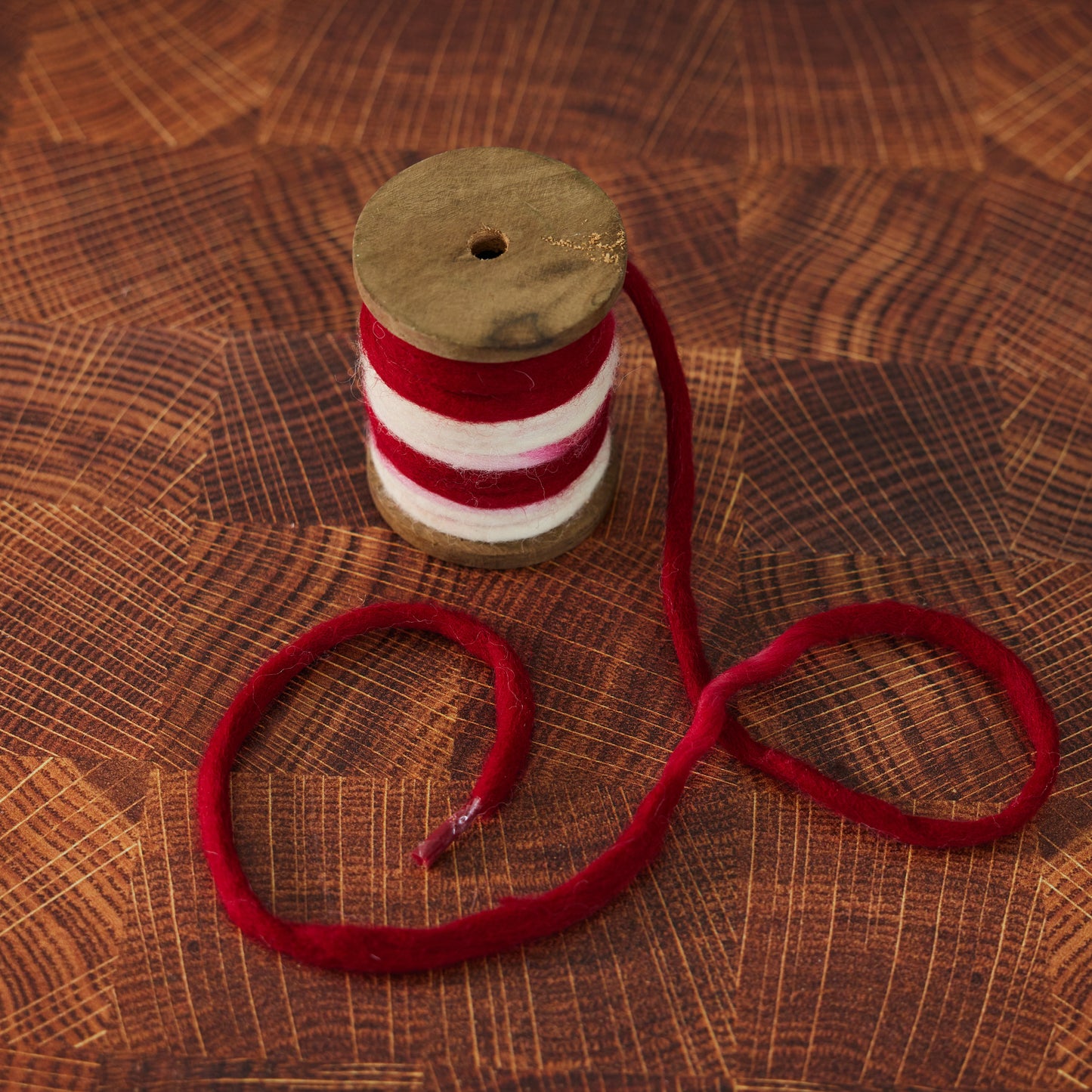 Red and Cream Spool of Wool